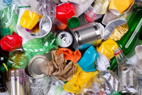 Business professionals managing waste in Canary Wharf office