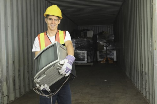 Materials being loaded at a local transfer station for recycling