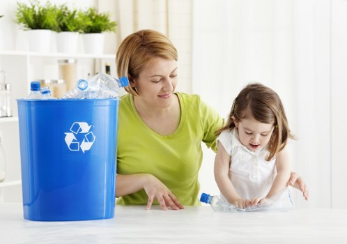 Recycling bins and waste containers in a Canary Wharf office